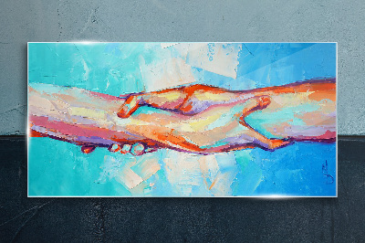 Glasbild Hände in Farbe vereinen