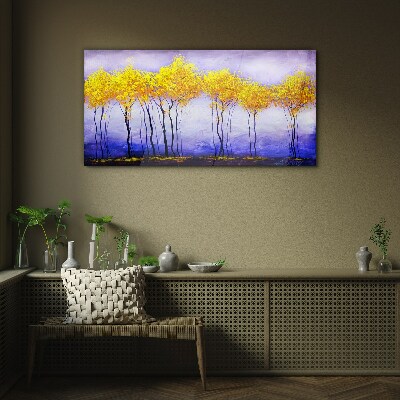 Glasbild Goldene Bäume in einer violetten Landschaft