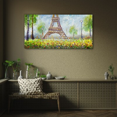 Glasbild Der Eiffelturm in floraler Umgebung