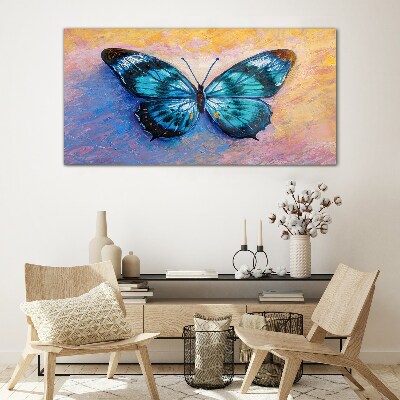 Foto auf glas Blauer Schmetterling auf pastellfarbenem Hintergrund
