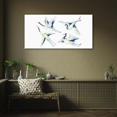 Glasbild Tanzende Kraniche im Blau