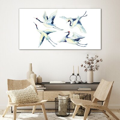 Glasbild Tanzende Kraniche im Blau