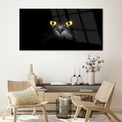 Glasbild Goldene Augen einer Katze im Schatten