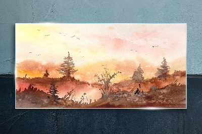 Glasbild Sonnenuntergang über einer Waldlandschaft