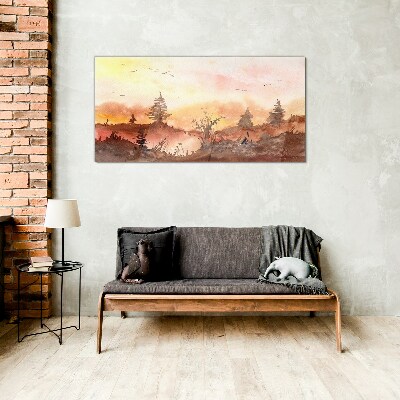 Glasbild Sonnenuntergang über einer Waldlandschaft