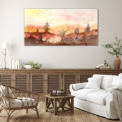 Glasbild Sonnenuntergang über einer Waldlandschaft