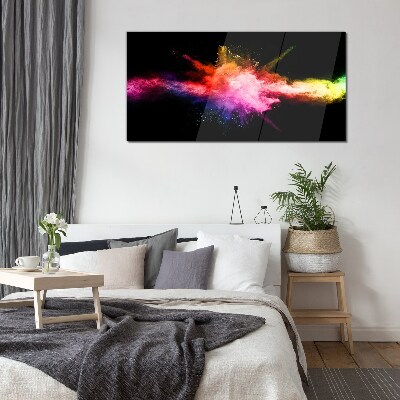 Glasbild Eine Explosion von Farben im Dunkeln