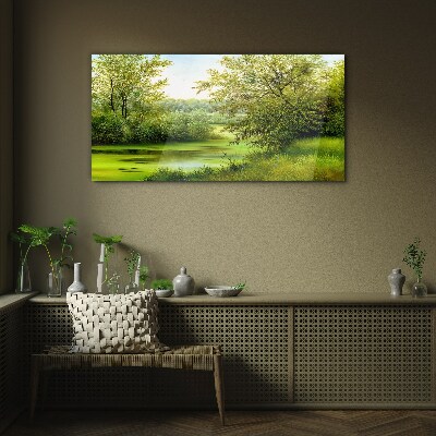Glasbild Grüne Landschaft am Wasser