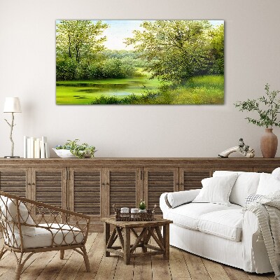 Glasbild Grüne Landschaft am Wasser