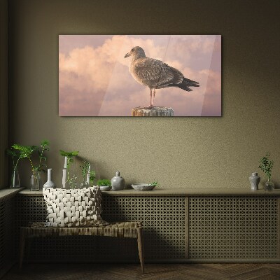 Glasbild Geflügelter Wächter in den Wolken