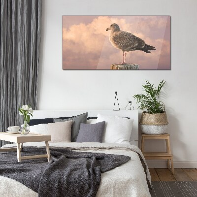 Glasbild Geflügelter Wächter in den Wolken