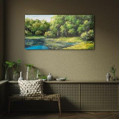 Glasbild Grüne Landschaft über dem Wasser