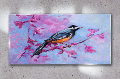 Glasbild Frühlingsvogel auf rosa Zweigen