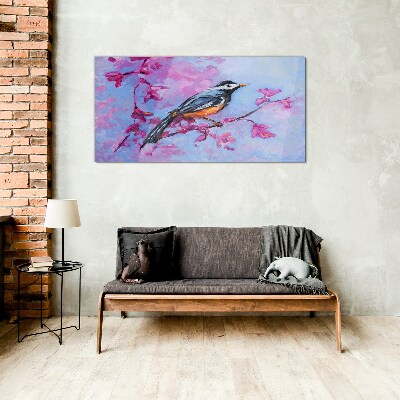 Glasbild Frühlingsvogel auf rosa Zweigen