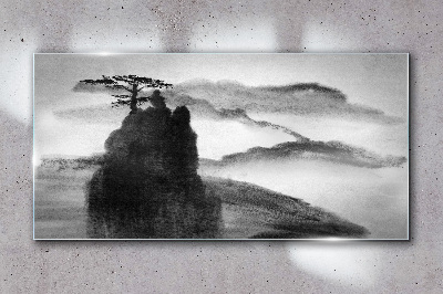 Glasbild Ein einsamer Baum auf einem felsigen Berg