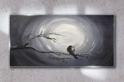 Glasbild Ein einsamer Vogel auf einem Ast