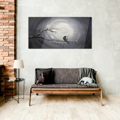 Glasbild Ein einsamer Vogel auf einem Ast