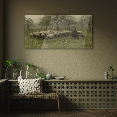 Glasbild Schafe grasen in einer mystischen Landschaft
