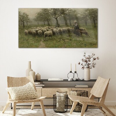 Glasbild Schafe grasen in einer mystischen Landschaft