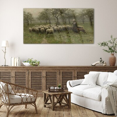 Glasbild Schafe grasen in einer mystischen Landschaft
