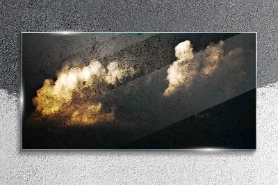 Glasbild Goldene Wolken auf dunklem Hintergrund