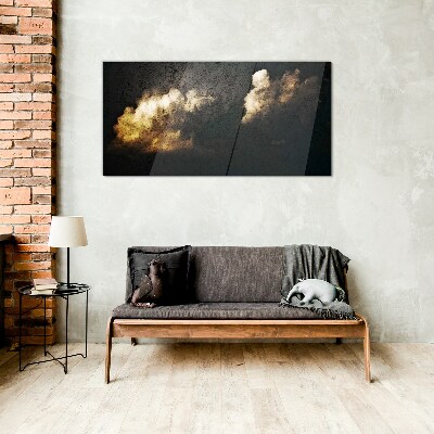 Glasbild Goldene Wolken auf dunklem Hintergrund