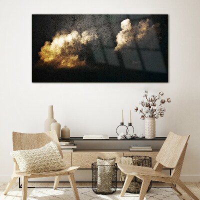 Glasbild Goldene Wolken auf dunklem Hintergrund
