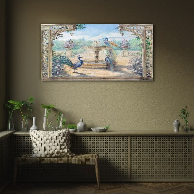 Glasbild Landschaft mit Pfau und Brunnen
