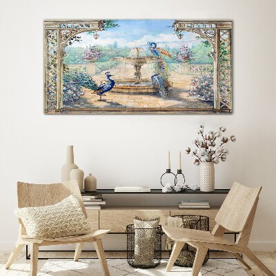 Glasbild Landschaft mit Pfau und Brunnen