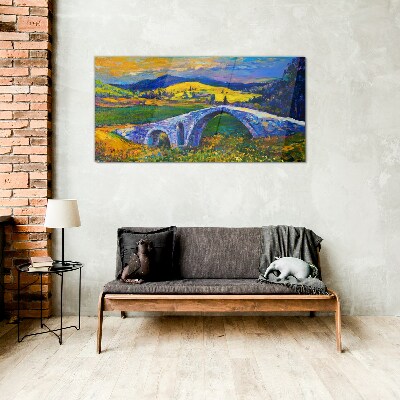 Glasbild Regenbogenbrücke in malerischer Landschaft