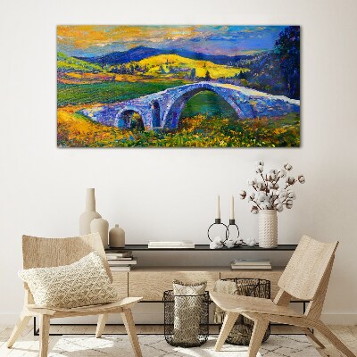 Glasbild Regenbogenbrücke in malerischer Landschaft