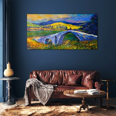 Glasbild Regenbogenbrücke in malerischer Landschaft