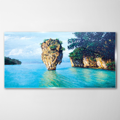 Glasbild Eine ruhige Bucht mit einem hohen Felsen