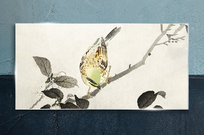 Glasbild Goldener Vogel auf einem Ast
