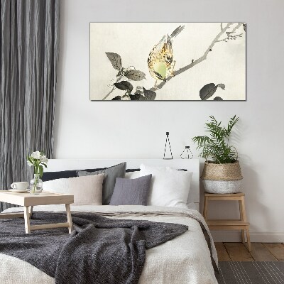 Glasbild Goldener Vogel auf einem Ast