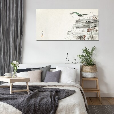 Glasbild Ein Vogel vor einer japanischen Landschaft
