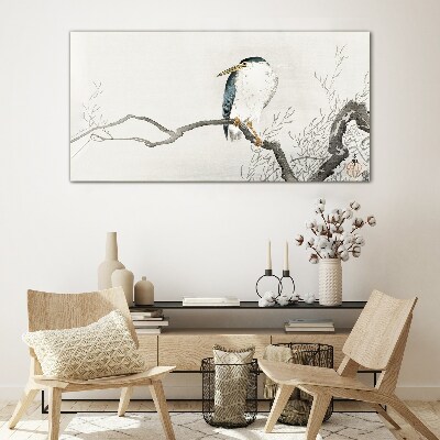 Glasbild Ein Vogel auf einem Ast in einer zarten Landschaft