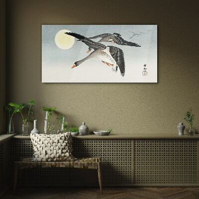 Glasbild Gänse im Flug unter dem Vollmond