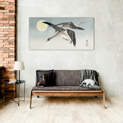 Glasbild Gänse im Flug unter dem Vollmond