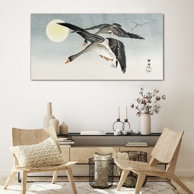 Glasbild Gänse im Flug unter dem Vollmond