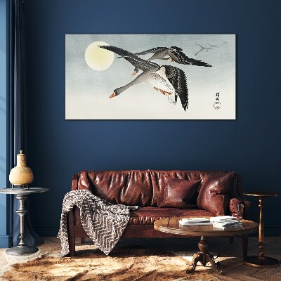 Glasbild Gänse im Flug unter dem Vollmond