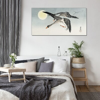Glasbild Gänse im Flug unter dem Vollmond
