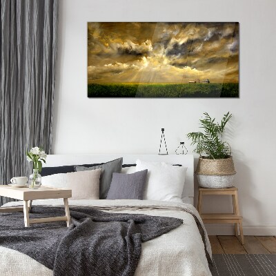 Glasbild Eine friedliche Landschaft mit Wolken