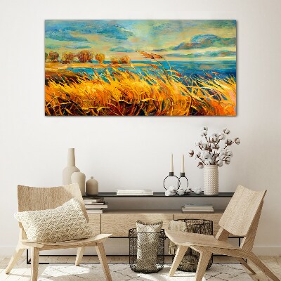 Glasbild Goldenes Gras über blauem Wasser