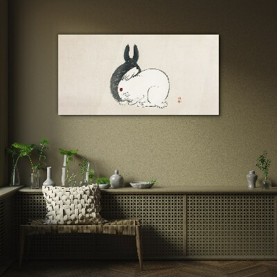 Glasbild Schwarz-weißes Kaninchen in Harmonie