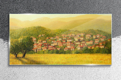 Glasbild Ein sonniges Dorf inmitten der Hügel