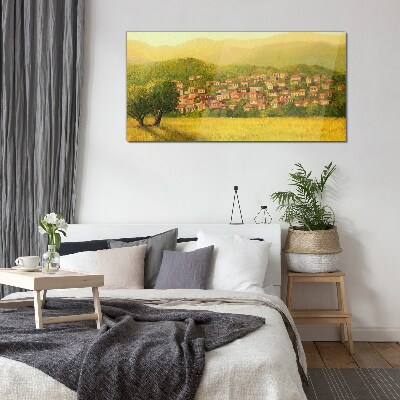 Glasbild Ein sonniges Dorf inmitten der Hügel