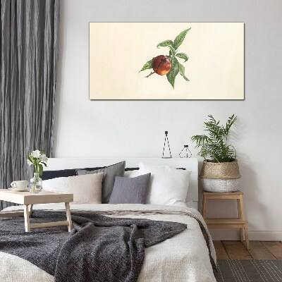 Glasbild Apfel auf einem Hintergrund aus Blättern