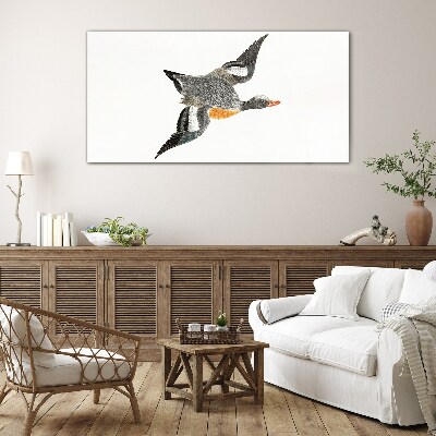 Glasbild Fliegende Gans in den Farben der Natur