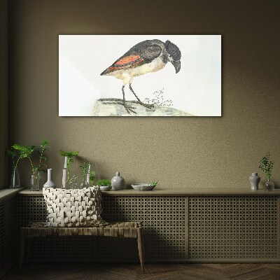 Glasbild Ein Vogel vor einem natürlichen Hintergrund